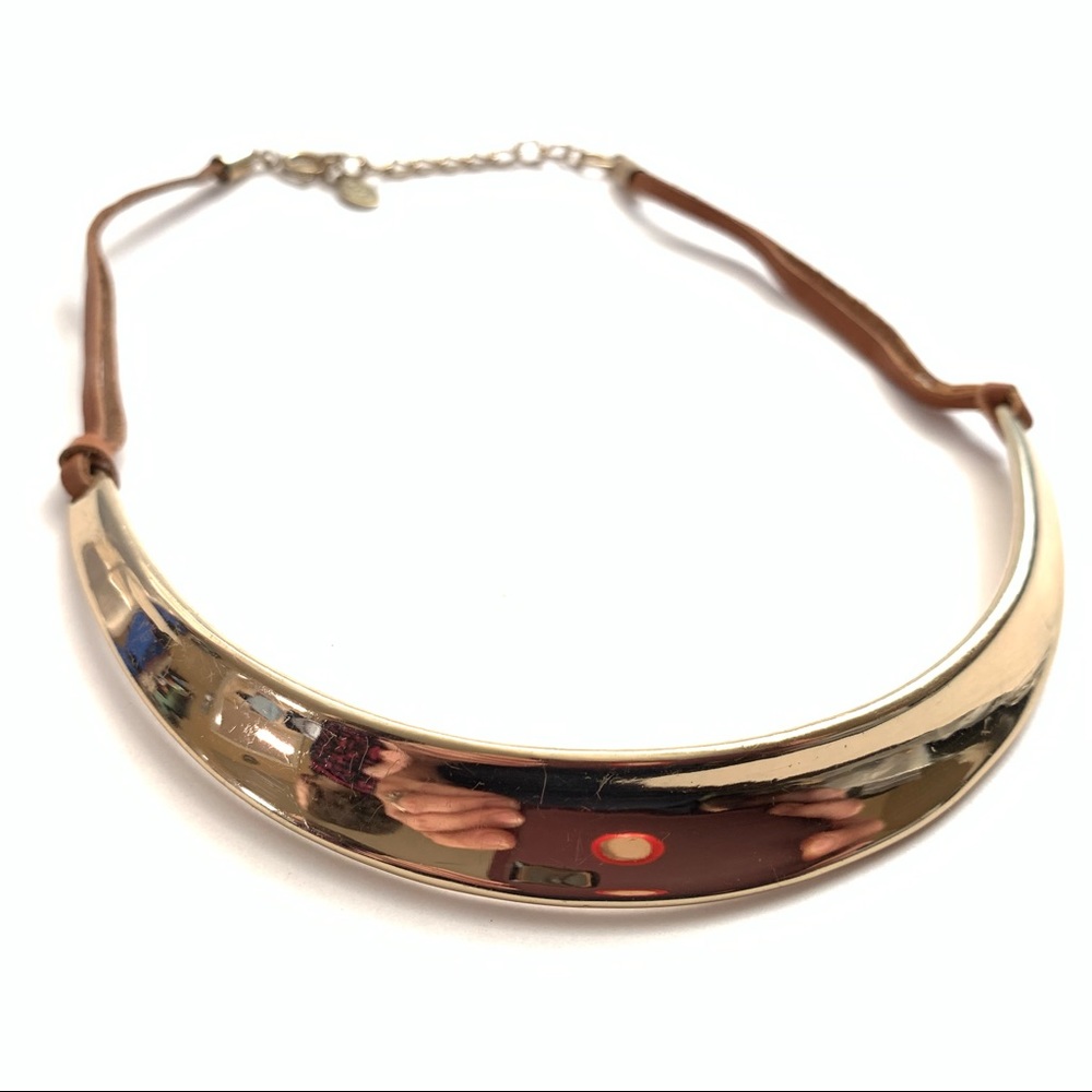 Gold tone and leather necklace